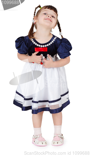 Image of Little beautiful smiling girl in a dress