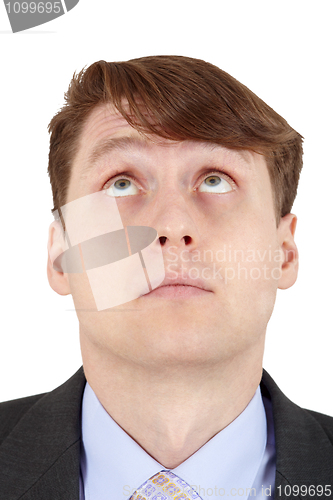 Image of Young man looks up, isolated on white background