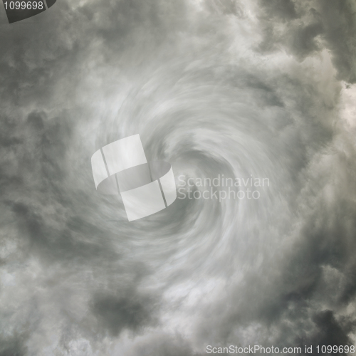 Image of Twisting spiral sky with storm clouds