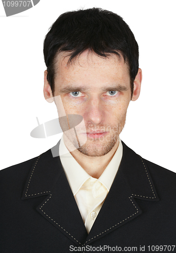 Image of Serious young man with unshaven face
