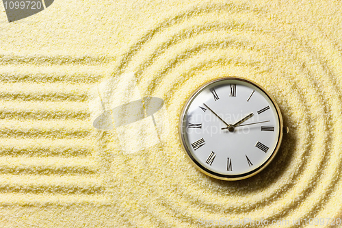 Image of Composition on Zen garden - sand, and watch