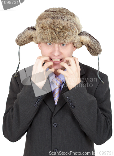 Image of Emotional comical Russian man in fur hat