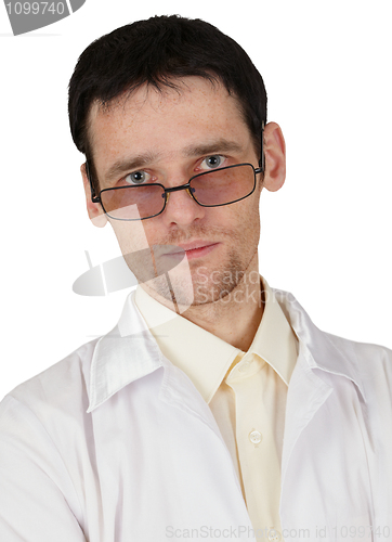 Image of Portrait of tired young doctor on white