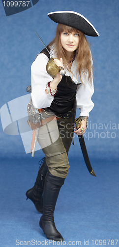 Image of Aggressive woman in pirate costume on blue background