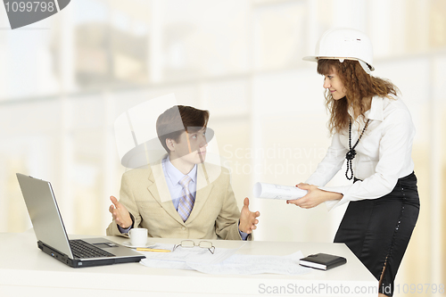 Image of Young engineers on workplace