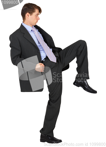 Image of Businessman knee kick on white background 