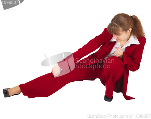 Image of Business woman kicks isolated on white
