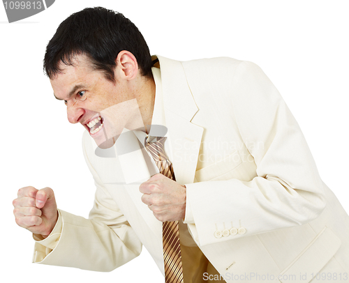 Image of Savage businessman emotionally clenched fists