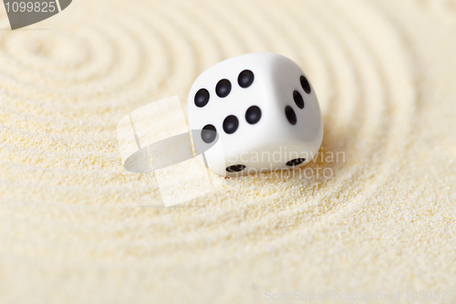 Image of Abstract composition in sand with white dice - Zen Garden