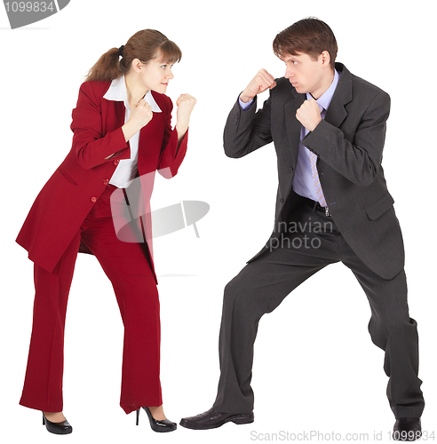 Image of Man and woman in business suits are going to fight