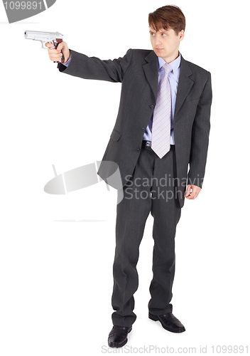 Image of Young man aiming a firearm on white background