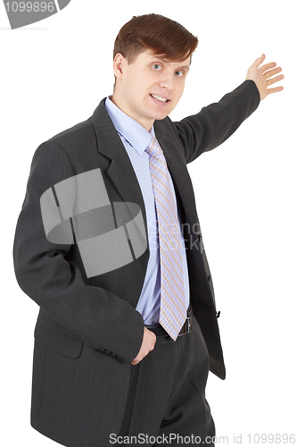 Image of Young man in business suit shows his hand
