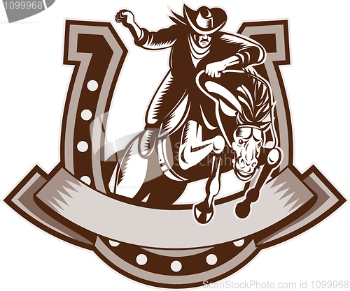 Image of Rodeo Cowboy riding   bronco horse