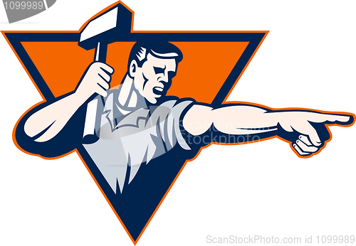 Image of male worker with hammer pointing
