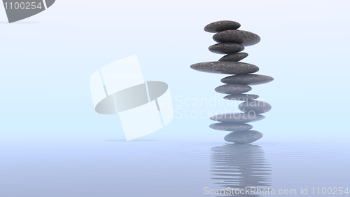 Image of Mist and Plie of Pebbles on water