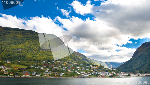 Image of Mountains, village and Norwegian fiord