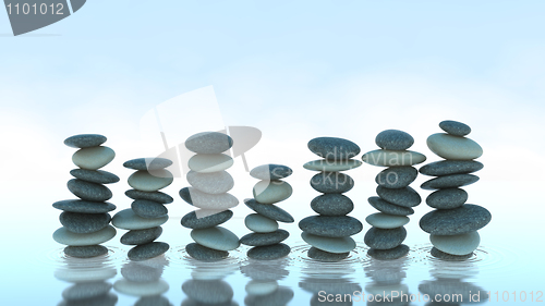 Image of Seven Pebble stacks on water