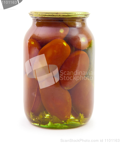 Image of Marinated tomatoes in glass jar isolated on white background