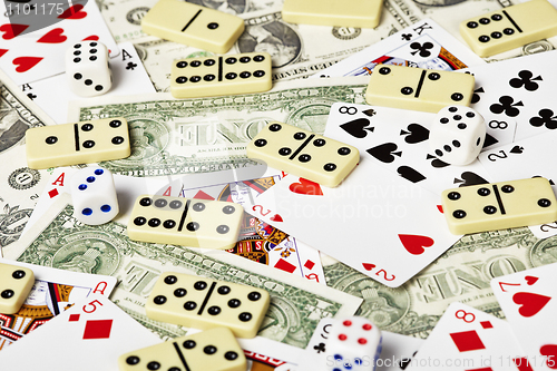 Image of Cards, money, dominoes and dices