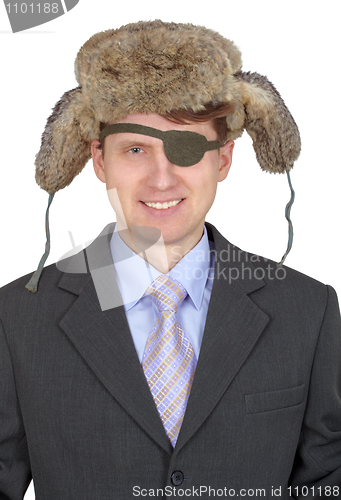 Image of Laughing, one-eyed man in fur hat, on white background