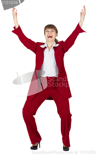 Image of Jubilant young woman in red business suit