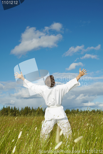 Image of Happy person rejoices lives on nature