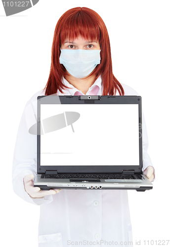 Image of Woman - doctor shows a computer screen