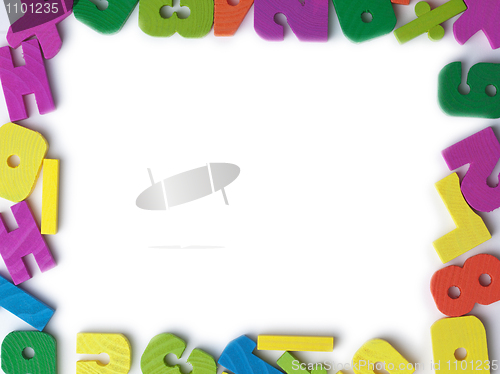 Image of Blank frame of colored wooden toy figures
