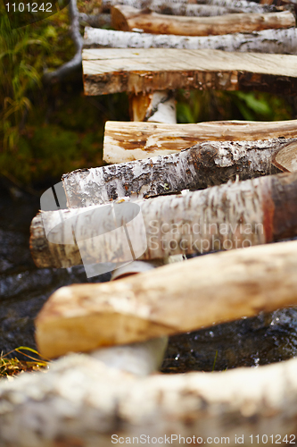 Image of Wooden bridge over stream