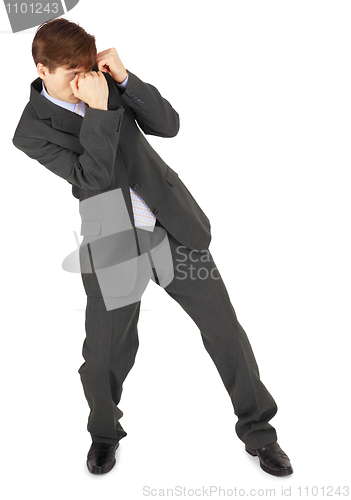 Image of Young businessman parries a blow