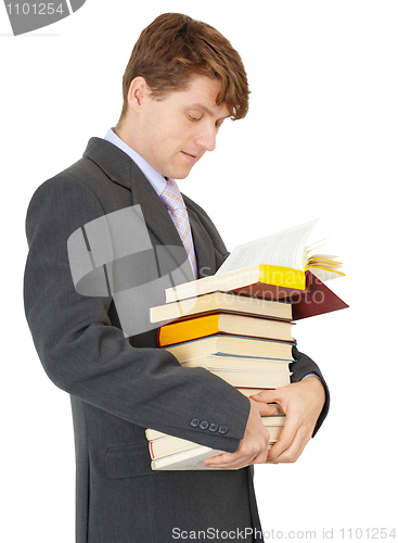 Image of Student with bunch of books