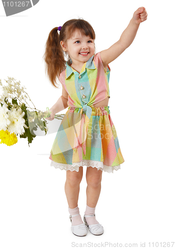 Image of Cheerful child with bouquet of flowers