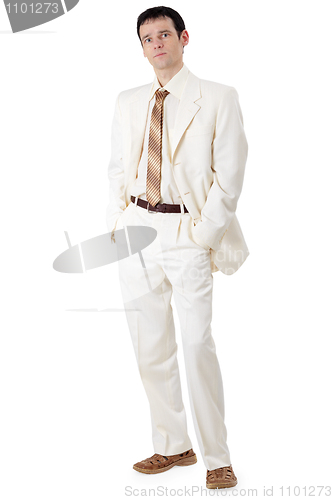 Image of Young handsome businessman in white suit