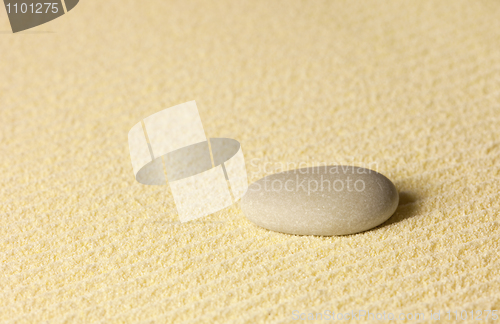 Image of Element of Japanese rock-garden - stone on sand