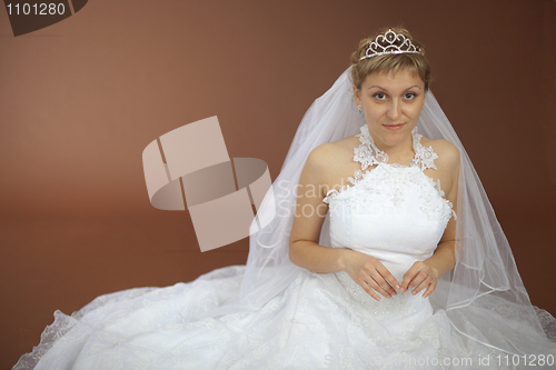 Image of Beautiful amusing bride in white dress