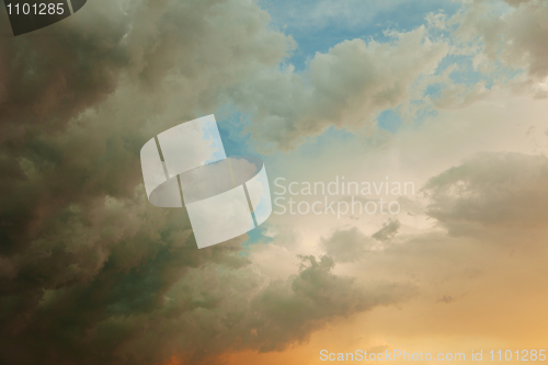 Image of Beautiful cloudy sky on summer evening