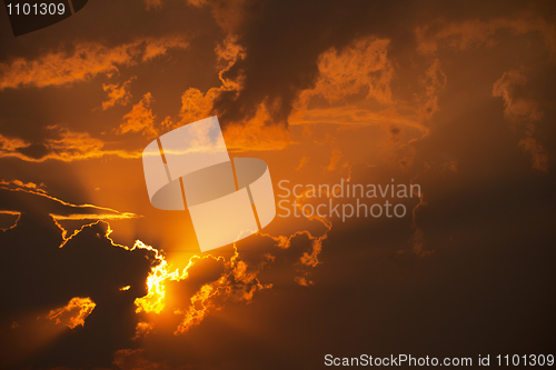 Image of Orange sunset in clouds