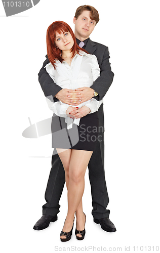 Image of Young man embraces beautiful girl