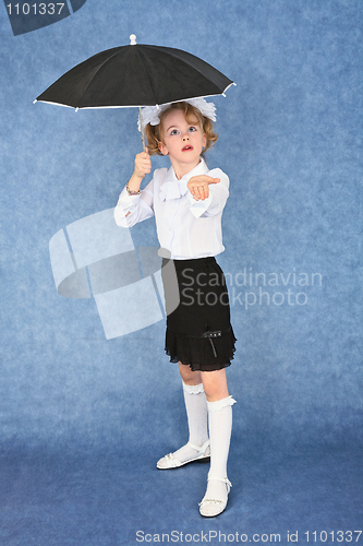 Image of Girl with an umbrella under imaginary rain