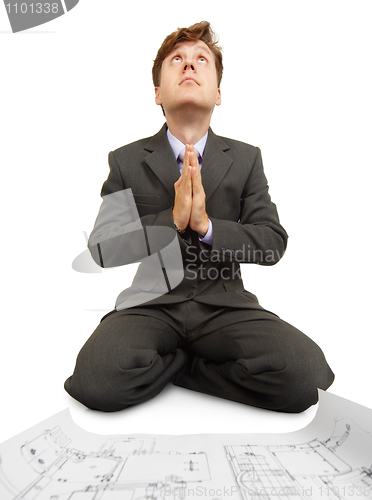 Image of Engineering prays to Technology God on knees