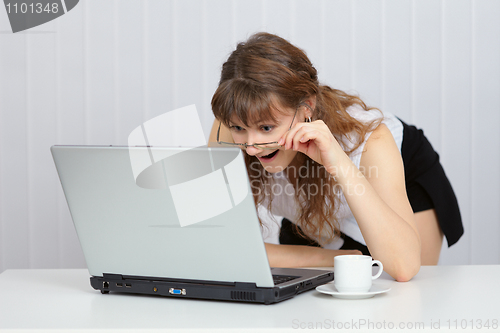Image of Woman received good news from Internet