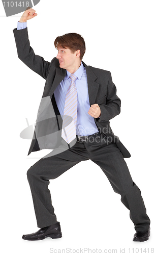 Image of Young man beats his fist on white background