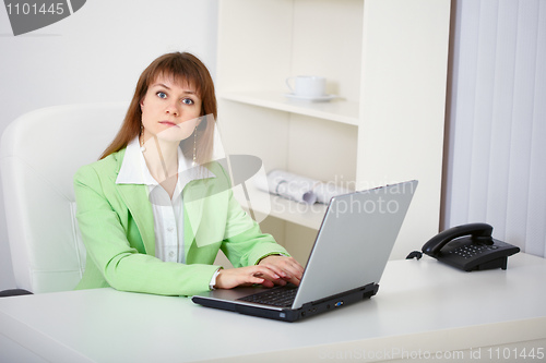 Image of Women prevented from working on computer