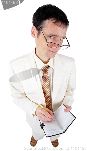 Image of Funny young business man with a notebook