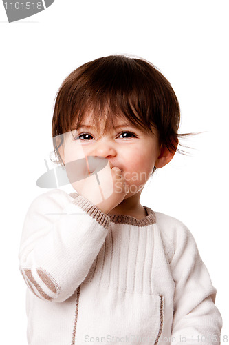 Image of Cute mischievous baby toddler face