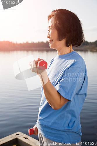 Image of Senior asian woman exercise