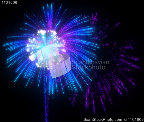 Image of Festive purple and blue fireworks at night 