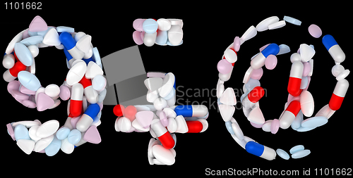 Image of Pills font 9 plus minus and at symbols