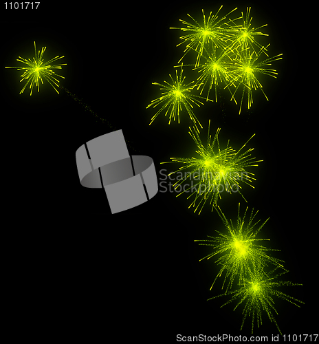 Image of Festive green fireworks at night