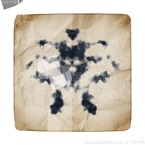 Image of old paper with Rorschach graphic